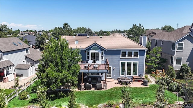 9992 Cottoncreek Dr, Highlands Ranch, CO 80130 - rear view of property featuring a patio, a residential view, and a wooden deck