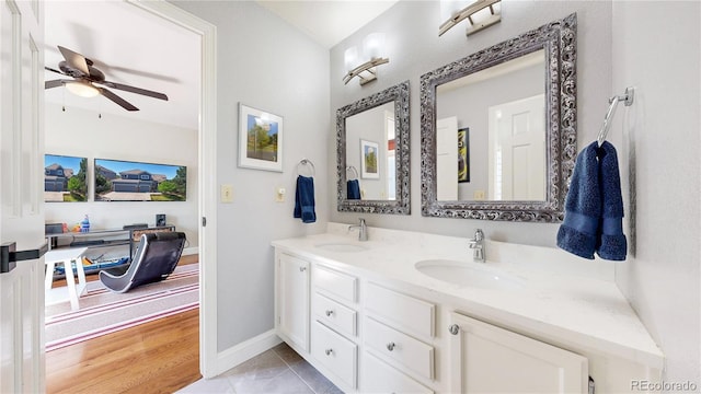 9992 Cottoncreek Dr, Highlands Ranch, CO 80130 - bathroom featuring double vanity and ceiling fan