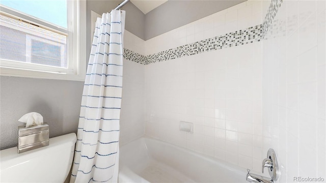 9992 Cottoncreek Dr, Highlands Ranch, CO 80130 - bathroom with shower / bath combo with shower curtain and toilet