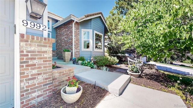 9992 Cottoncreek Dr, Highlands Ranch, CO 80130 - entrance to property featuring brick siding