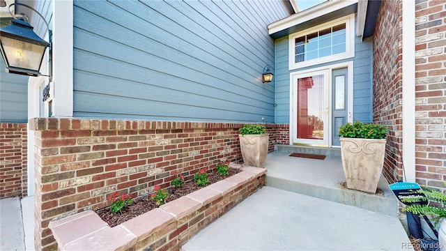 9992 Cottoncreek Dr, Highlands Ranch, CO 80130 - property entrance with brick siding