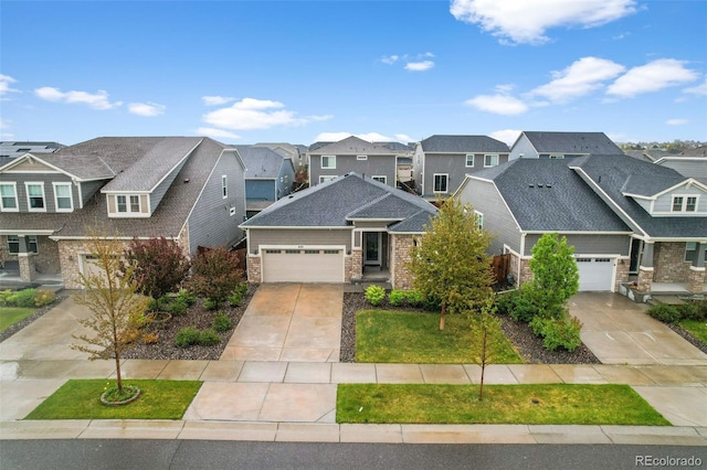craftsman-style house featuring a residential view, concrete driveway, stone siding, and a garage