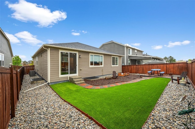 rear view of property with cooling unit, entry steps, and a patio