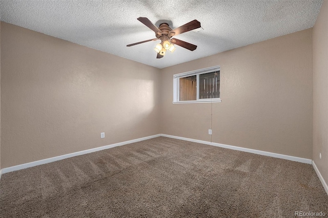 empty room featuring ceiling fan, carpet flooring, and a textured ceiling