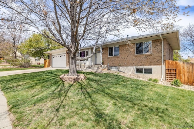 single story home featuring concrete driveway, fence, a front yard, and a garage