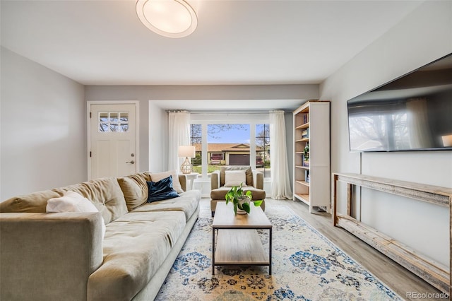 living area with wood finished floors