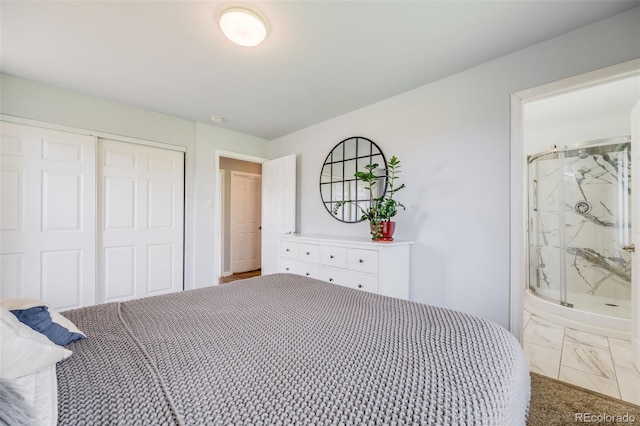 bedroom with a closet and connected bathroom