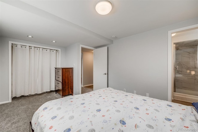 carpeted bedroom with recessed lighting, baseboards, and ensuite bath