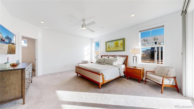 885 Delechant Dr, Erie, CO 80516 - bedroom with light carpet, multiple windows, baseboards, and recessed lighting
