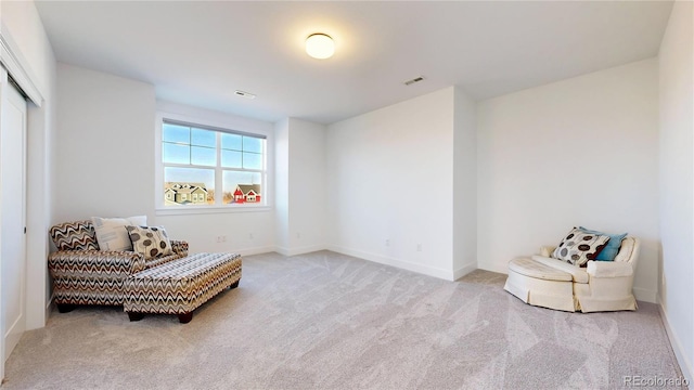 885 Delechant Dr, Erie, CO 80516 - sitting room featuring baseboards, visible vents, and light colored carpet