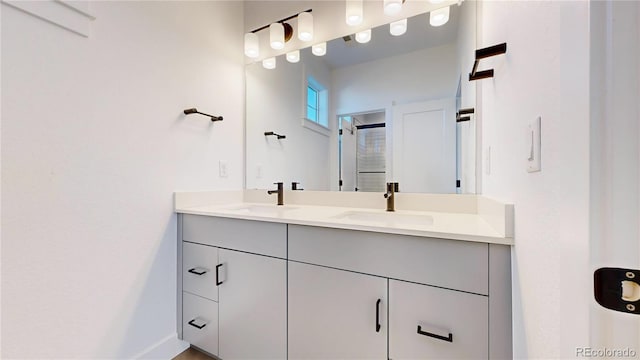 885 Delechant Dr, Erie, CO 80516 - bathroom featuring double vanity and a sink