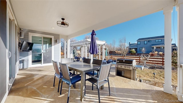 885 Delechant Dr, Erie, CO 80516 - view of patio / terrace with outdoor dining space, an outdoor kitchen, a grill, and a pergola