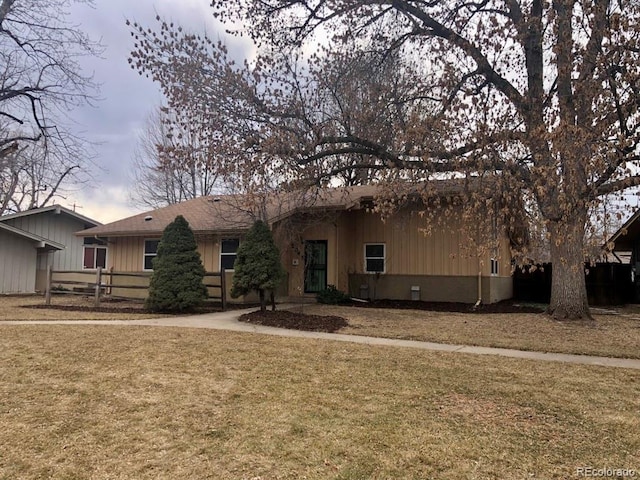 view of front of home with a front yard