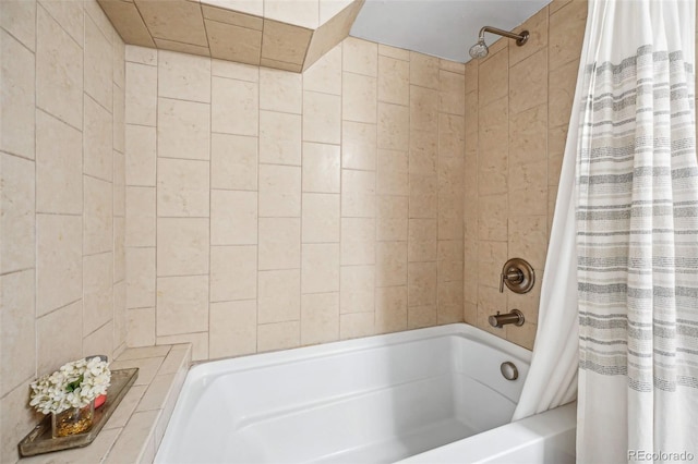 full bath featuring shower / tub combo with curtain