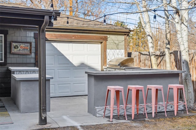 garage featuring fence