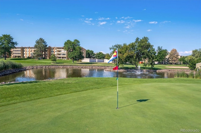 9380 E Center Ave Unit 8A, Denver, CO 80247 - view of property's community featuring a water view, a yard, and golf course view
