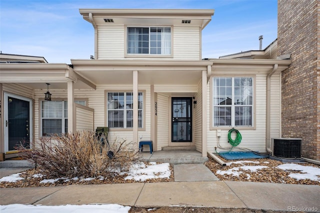 view of front of house with central AC unit