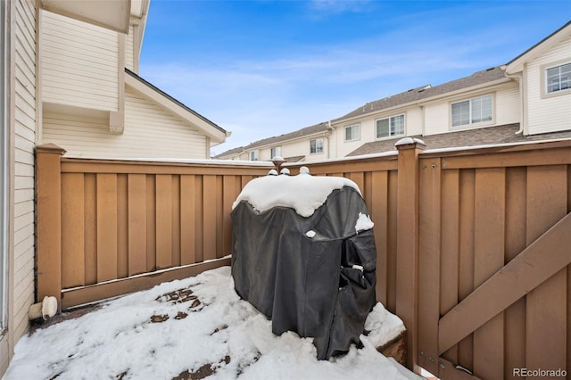 view of yard layered in snow