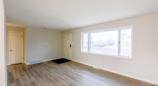 entrance foyer with light hardwood / wood-style floors