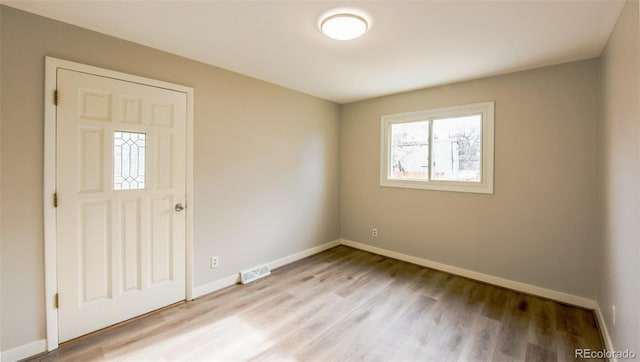 empty room featuring light wood-type flooring