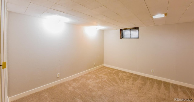 basement with carpet flooring