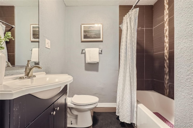 full bath featuring baseboards, a textured wall, toilet, shower / bathtub combination with curtain, and vanity