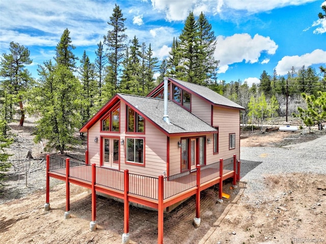 1840 Ute Trl, Como, CO 80432 - rear view of house featuring french doors, a deck, and a shingled roof