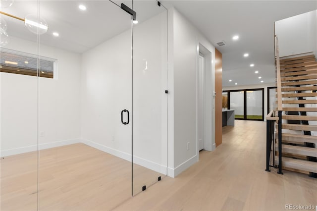 hallway featuring light wood-type flooring