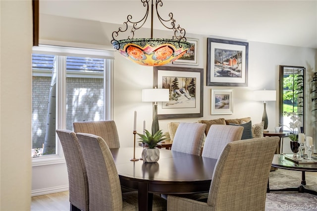 74 Blue Heron Dr, Greenwood Village, CO 80121 - dining area featuring baseboards and wood finished floors