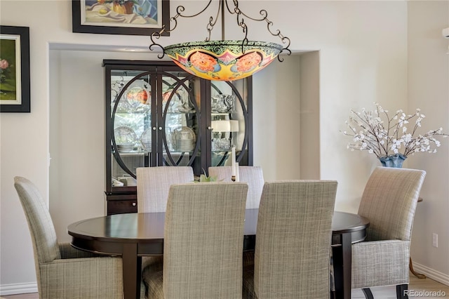 74 Blue Heron Dr, Greenwood Village, CO 80121 - dining room with baseboards and wood finished floors