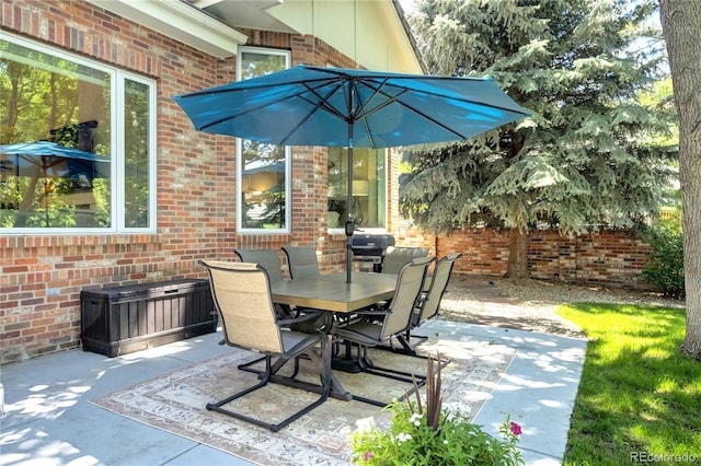 74 Blue Heron Dr, Greenwood Village, CO 80121 - view of patio featuring outdoor dining area and grilling area