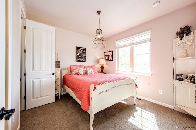 2115 Holmby Ct, Castle Rock, CO 80104 - bedroom with dark colored carpet and baseboards