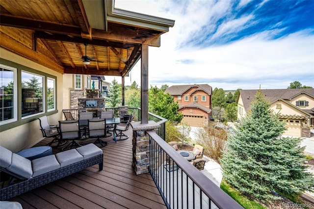 2115 Holmby Ct, Castle Rock, CO 80104 - wooden terrace with outdoor dining space, ceiling fan, and a residential view
