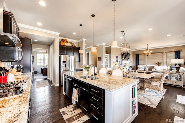 2115 Holmby Ct, Castle Rock, CO 80104 - kitchen featuring a sink, open floor plan, a center island with sink, recessed lighting, and dark wood finished floors