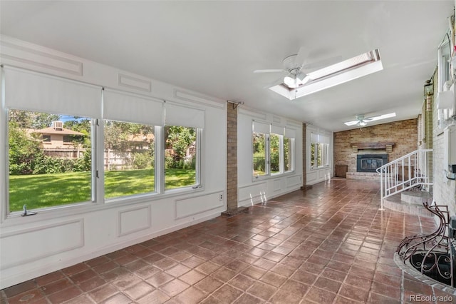 1637 S Stuart St, Denver, CO 80219 - unfurnished sunroom featuring a skylight and plenty of natural light