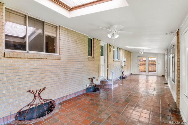 1637 S Stuart St, Denver, CO 80219 - unfurnished sunroom featuring a skylight