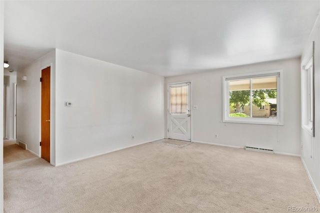 1637 S Stuart St, Denver, CO 80219 - empty room featuring light colored carpet and baseboards