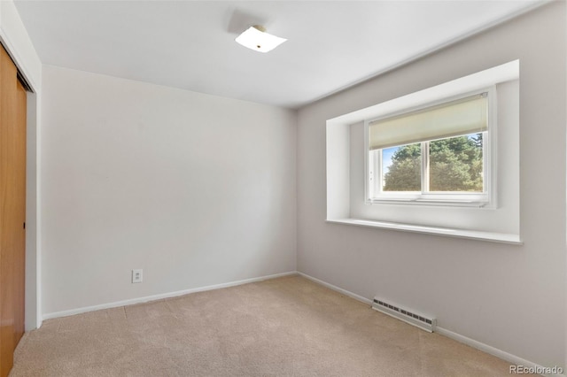 1637 S Stuart St, Denver, CO 80219 - carpeted empty room with baseboards