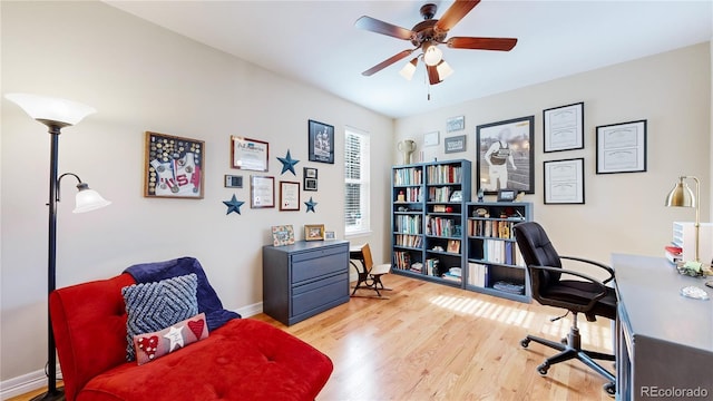 office with ceiling fan and wood-type flooring