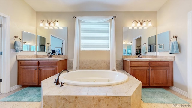 bathroom featuring vanity, tile patterned floors, and tiled bath