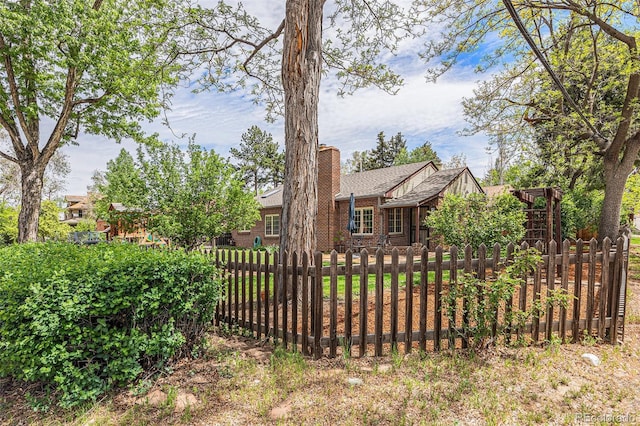 1900 Magnolia St, Denver, CO 80220 - view of front of house with a chimney