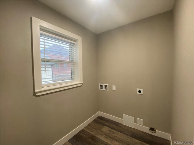 laundry area featuring electric dryer hookup, washer hookup, and dark hardwood / wood-style flooring