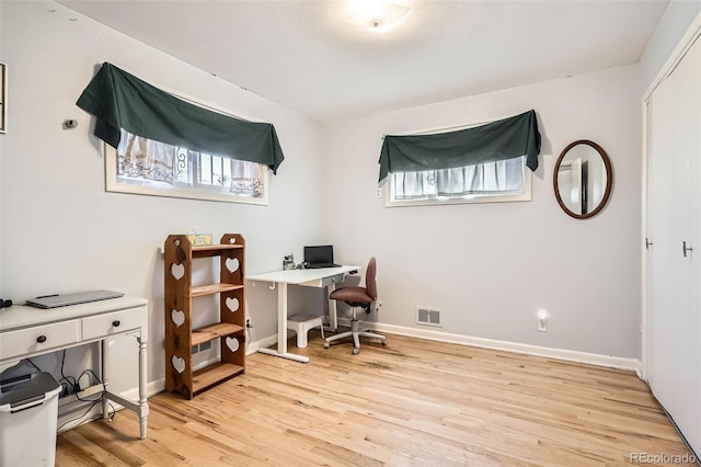 office area featuring light hardwood / wood-style flooring