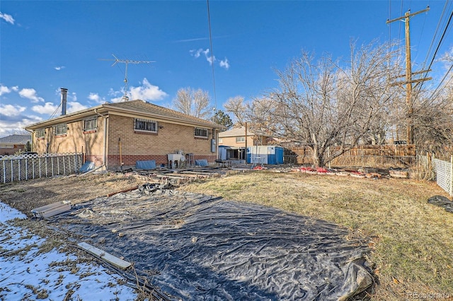 view of snow covered property