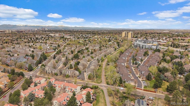 aerial view featuring a mountain view and a residential view