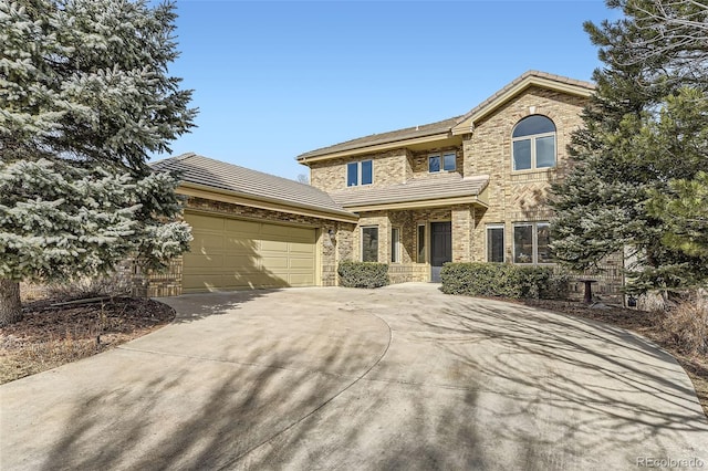 view of front of property with a garage