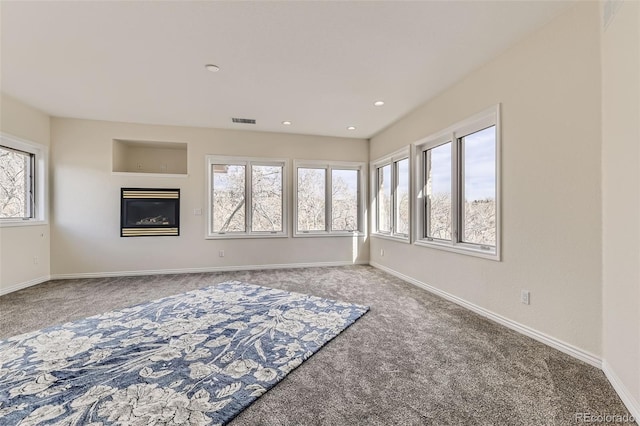 unfurnished living room with carpet floors