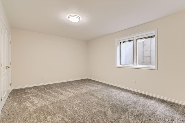 unfurnished room featuring carpet floors