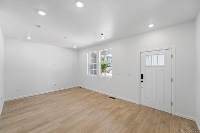 17123 W 91st Ln, Arvada, CO 80007 - foyer entrance with light wood-style floors and recessed lighting
