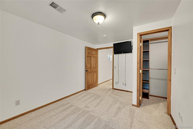 5722 W Chestnut Ave, Littleton, CO 80128 - unfurnished bedroom featuring carpet flooring and a closet